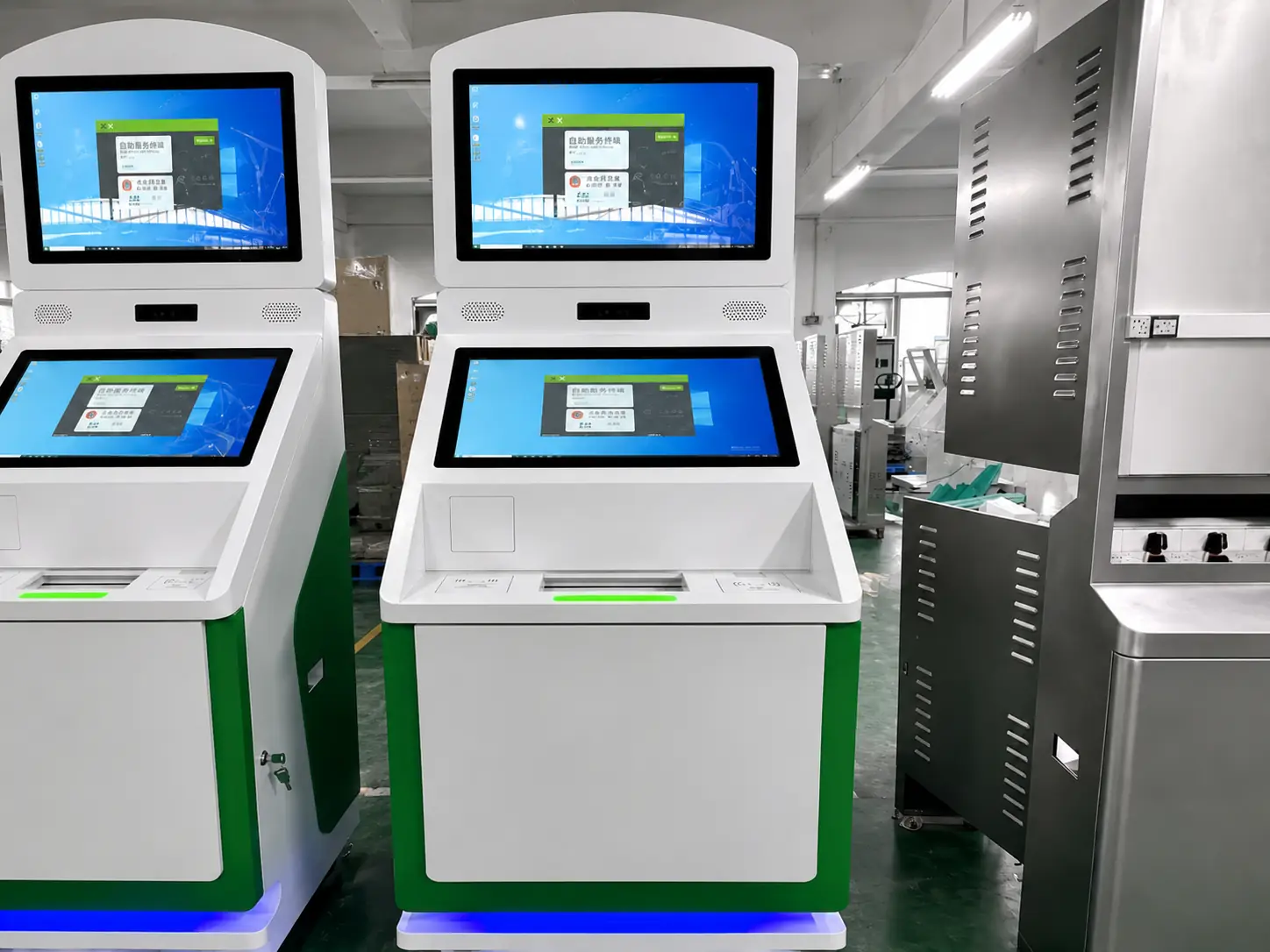 Complete self-service kiosk showing screen, enclosure, and peripheral integration